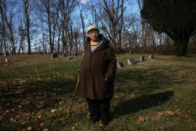Janis Ivory in the cemetery where her parents are buried in Rendville, OH where she grew up. Janis, her brother Harry and others are working to revitalize the old coal town.